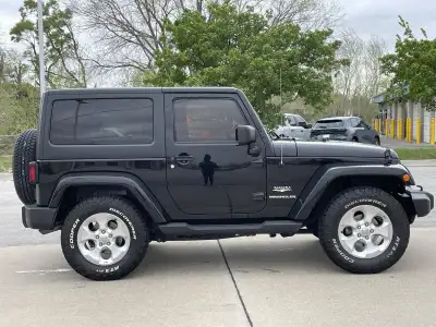 Pre-Owned 2015 Jeep Wrangler Sahara SUV/Crossover for sale in St. Joseph MO