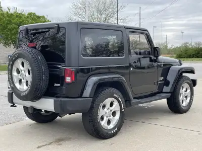 Pre-Owned 2015 Jeep Wrangler Sahara SUV/Crossover for sale in St. Joseph MO