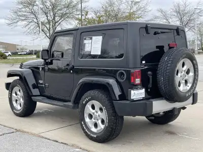 Pre-Owned 2015 Jeep Wrangler Sahara SUV/Crossover for sale in St. Joseph MO